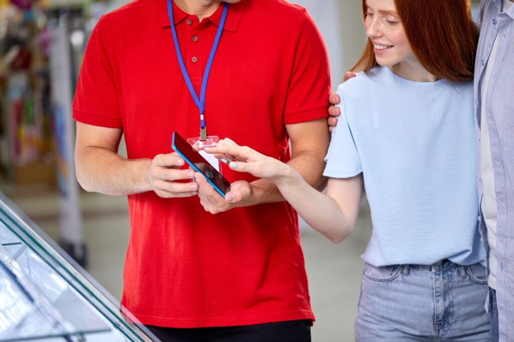 Salesperson performing a direct marketing strategy to a customer.