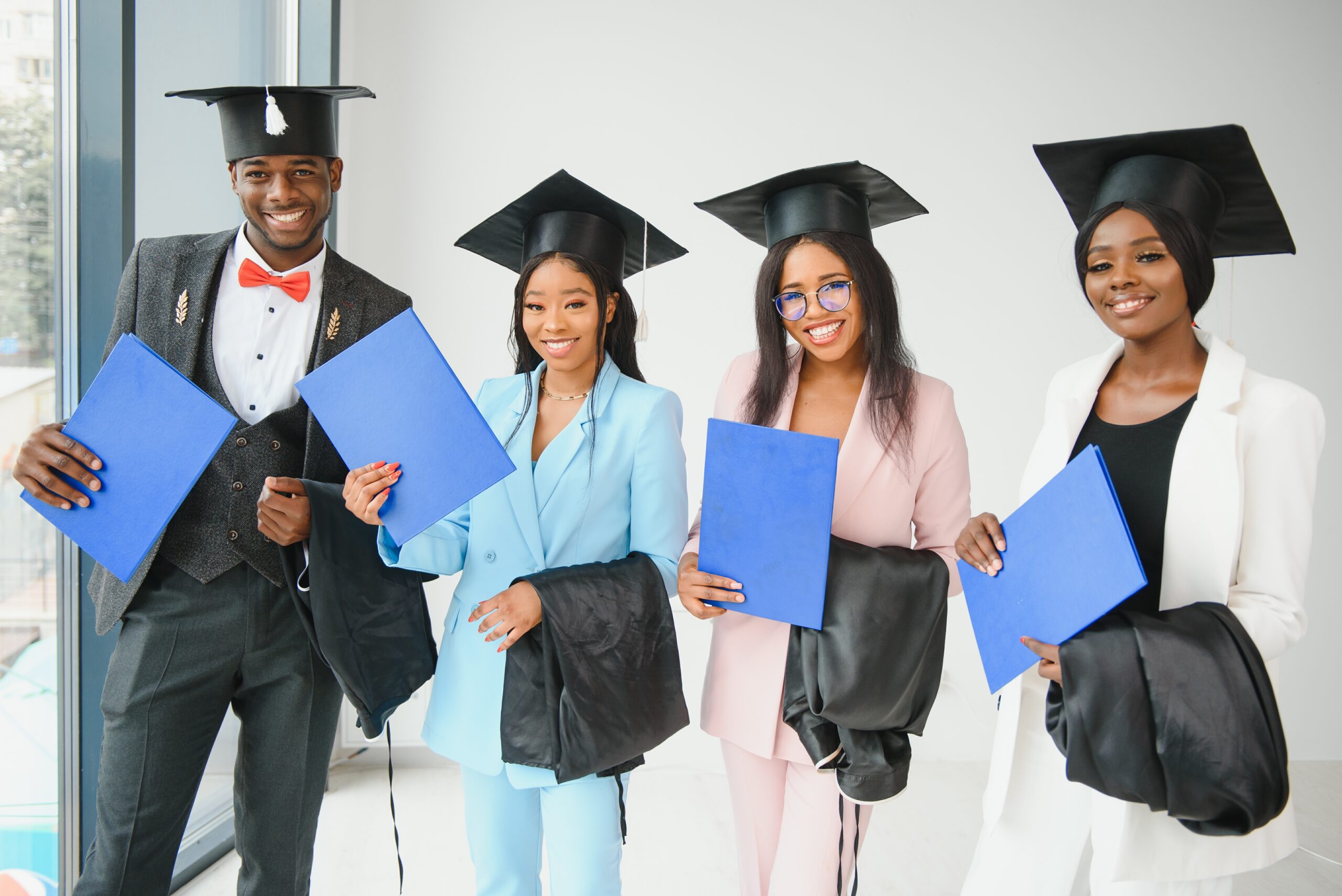 Group of graduates ready to enter the workforce, showcasing new graduate employment opportunities.